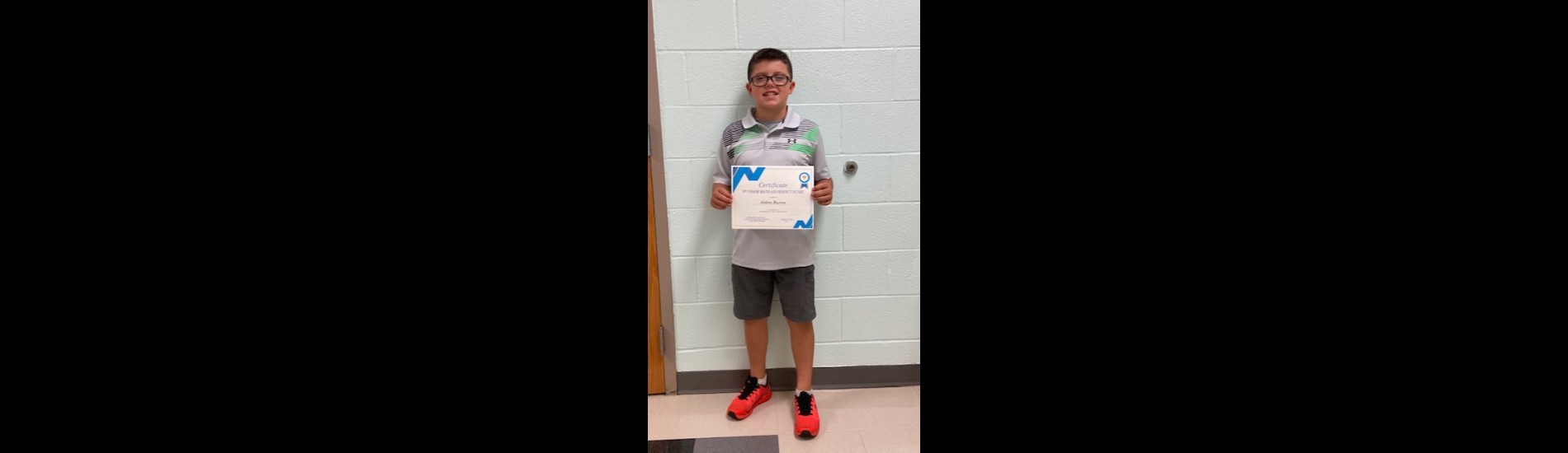 Aiden Burns poses with a recent award he earned.