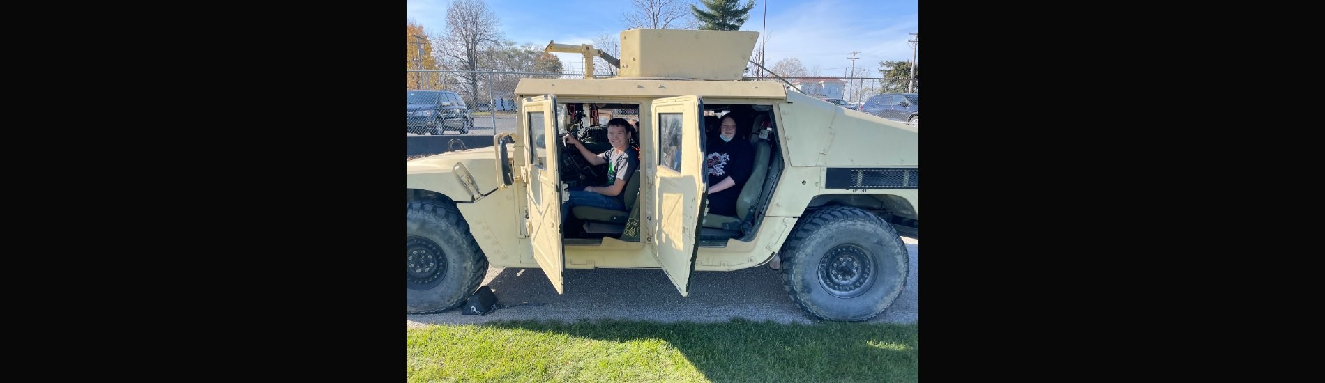 7th graders in the humvee loaned by the Arsenal