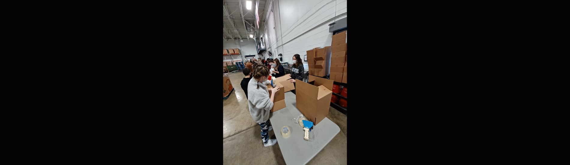 Windham JH and HS students volunteering at the Akron Regional Foodbank