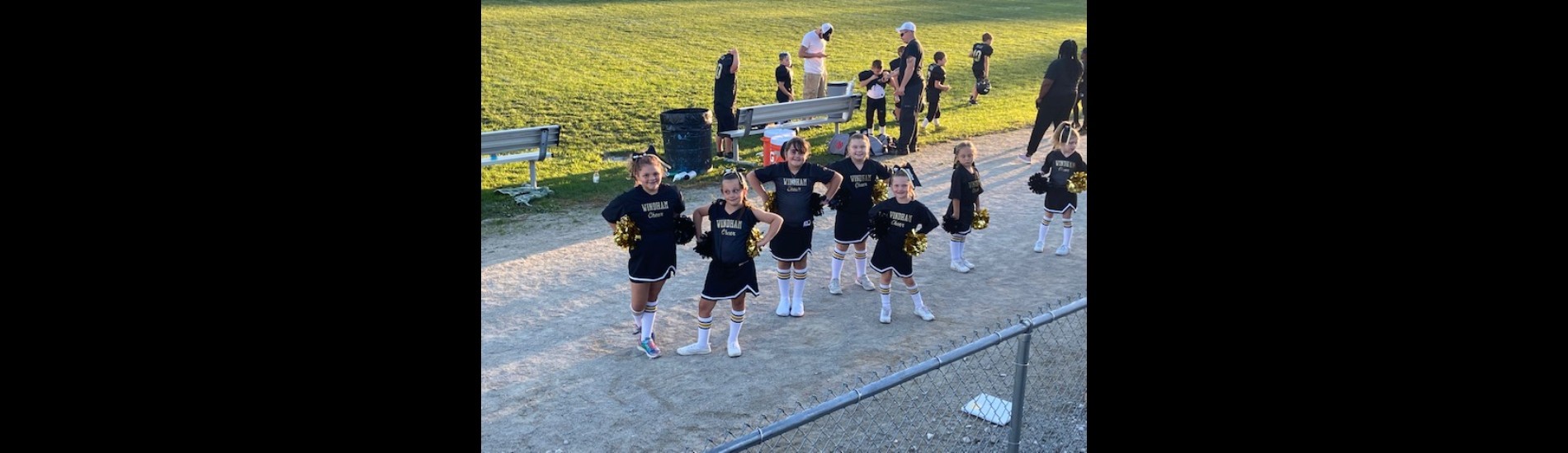 Elementary football cheerleaders showing team spirit!